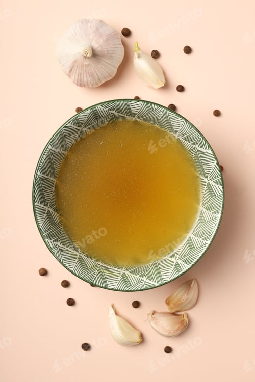 Preview: Concept of tasty food with broth on beige background