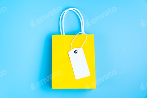 Preview: Bright Yellow Shopping Bag with a Blank White Tag