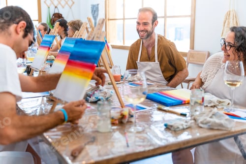 Preview: Art and Wine Workshop. Friends enjoying the painting workshop and drinking wine.