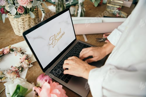 Preview: Woman using laptop