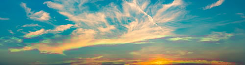 Preview: Beautiful blue and golden sky and clouds abstract background. White and golden clouds on sunset sky
