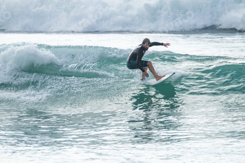 Preview: Local surfer riding waves