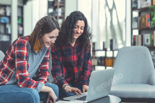 Preview: Happy students with laptop