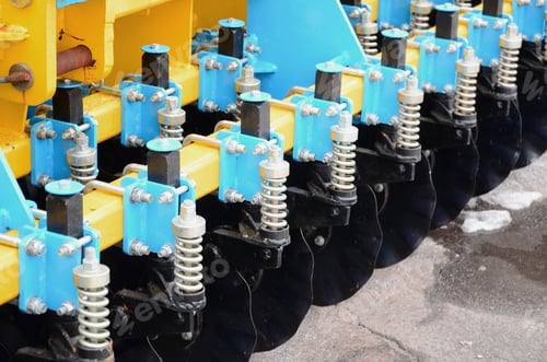 Preview: Spring system of agricultural seeder close up outdoors