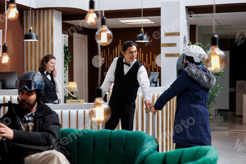 Preview: Bellboy helps female visitor at arrival