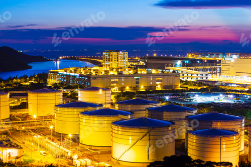 Preview: Oil tanks plant during sunset