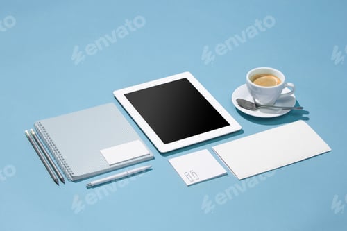 Preview: The laptop, pens, phone, note with blank screen on table