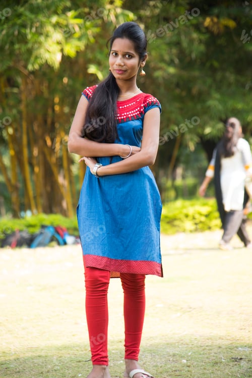 Preview: Outdoor portrait of beautiful young Indian girl in the park