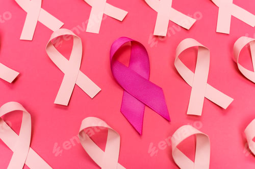 Preview: Pink ribbons of breast cancer awareness on pink background
