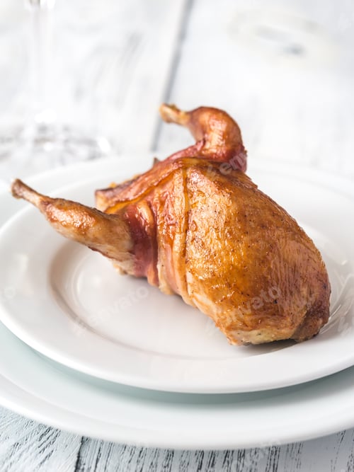 Preview: Baked quail wrapped in bacon