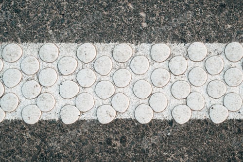 Preview: Cold plastic structured stripes with dot pattern for road surface marking as background