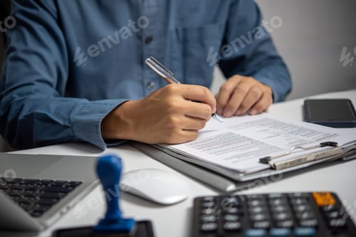 Preview: Business person Writing contract law and paper work for business and finance investments , write doc
