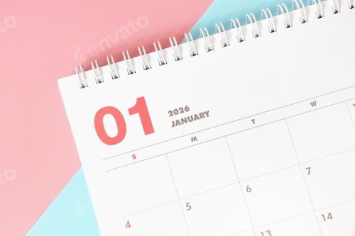 Preview: January 2026 calendar close-up on blue and pink background, planning concept.