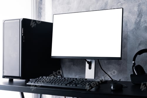 Preview: Black computer with white screen monitor on the desk.