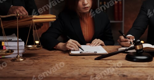 Preview: Lawyer discussing with client about contract, agreement, legal guideline, lawsuit. Lawyer work on do