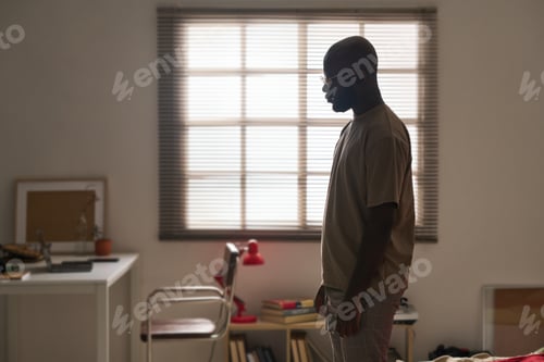 Preview: Man standing alone in the room