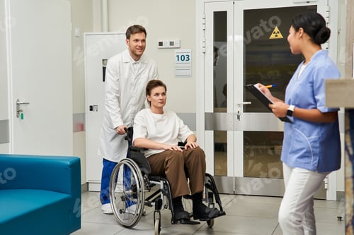Preview: Healthcare team preparing a patient for procedure in a modern hospital setting