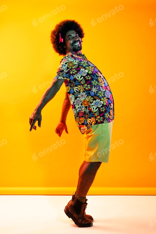 Preview: African man portrait in studio on colorful background