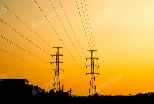 Preview: High voltage electric pole station on sunset background