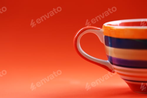 Preview: Closeup macro of colors orange cup decoration on orange texture blur background