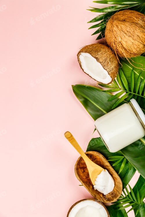 Preview: Coconut oil, tropical leaves and fresh coconuts