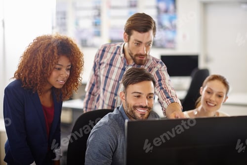 Preview: Cropped shot of a group of colleagues working together in an office