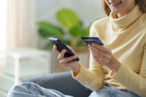 Preview: Woman Uses Cellphone to Pay with Credit Card