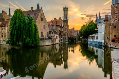 Preview: Bruges (Brugge) cityscape with water canal at sunset
