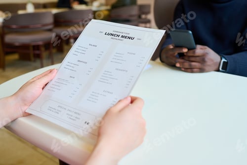 Preview: People coming to business lunch in cafe