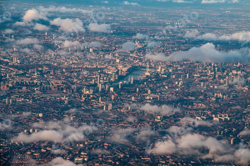 Preview: Aerial view of central London through the clouds