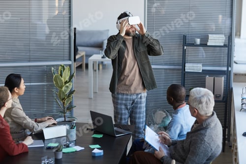 Preview: IT Development Team Testing VR Software in Office