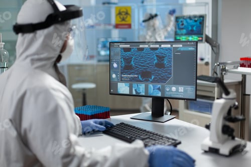 Preview: Biologist researcher wearing protective medical equipment