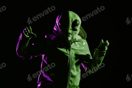 Preview: Futuristic alien showing frightening gesture, trying to scare. Creepy mask of humanoid planet