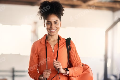 Preview: Portrait, fitness and gym with a sports black woman ready for exercise or training alone in a healt