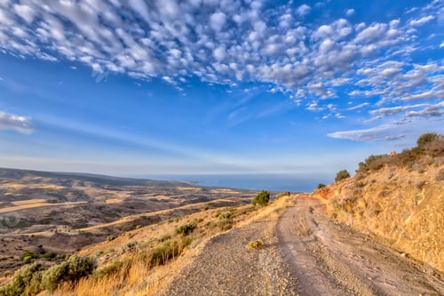 Preview: Mountain road with view over sea on Cyprus Island