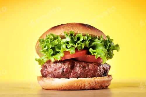 Preview: Homemade hamburger with large beef cutlet and fresh vegetables
