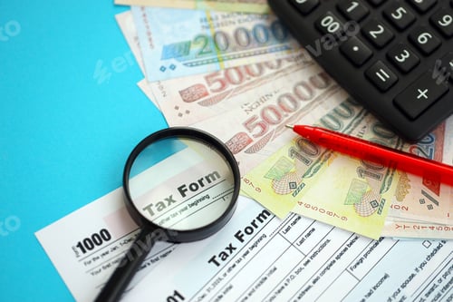 Preview: Vietnamese dong money bills and calculator with tax form on blue. Taxation and accounting concept