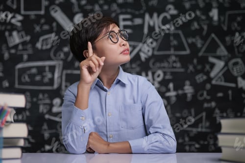 Preview: The teacher sat thinking about teaching in the classroom