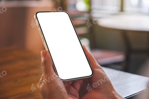 Preview: Mockup image of a woman holding mobile phone with blank desktop screen