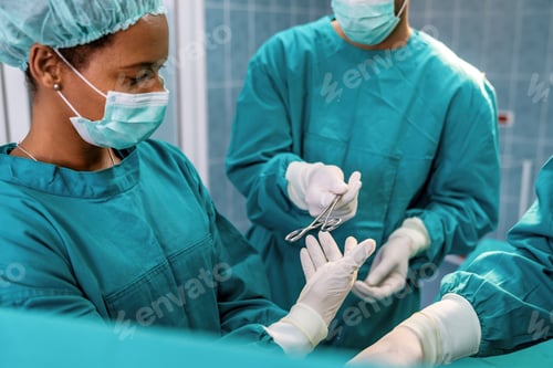 Preview: Group of surgeons at operation in operating room at hospital. Surgery, medicine and people concept