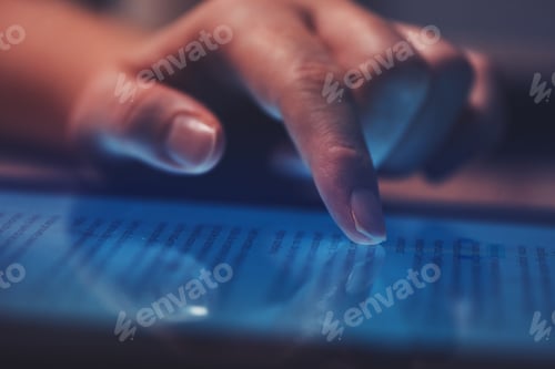 Preview: Extreme close up of female finger using digital tablet computer