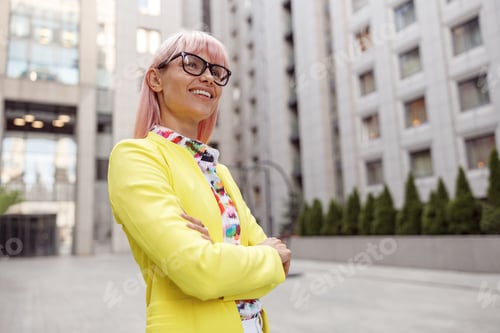 Preview: Hopeful female staring in distance from street