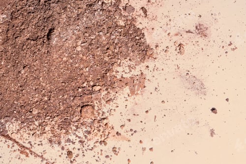 Preview: Crushed face powder bronzer, powder isolated on beige background, space for text, cosmetics swatch