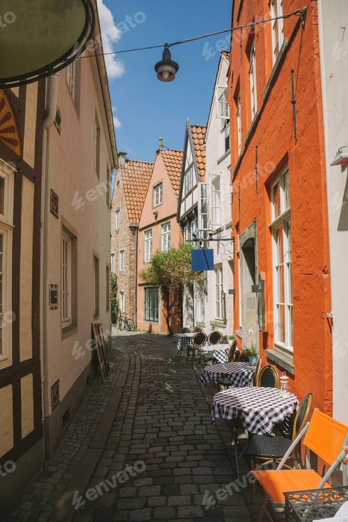 Preview: summer cafe and buildings at urban street in Bonn, Germany