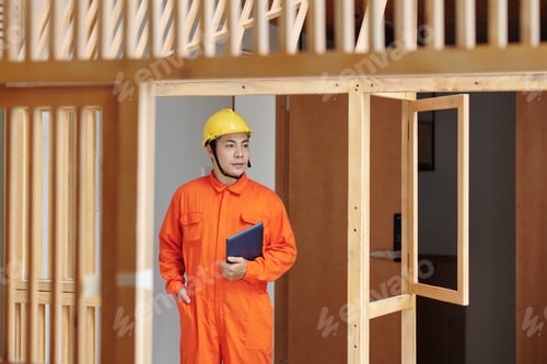 Preview: Foreman Walking Around House Under Construction