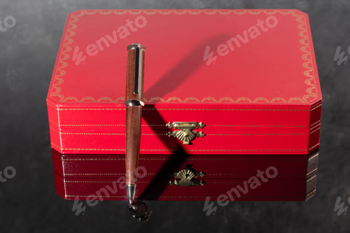 Preview: Branded pen with cufflinks and business card holder in a box. Gift set. Office interior.