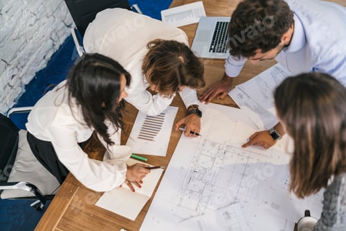 Preview: Young team of coworkers making great work discussion in modern c