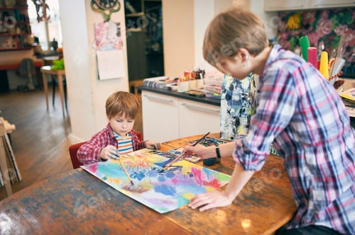 Preview: Cute happy little boy and teacher drawing in artist class.