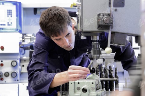 Preview: Germany, Young mechanic working in crafts workshop