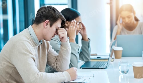 Preview: Tired, stress and business people in a meeting with a headache, problem and team depression. Sad, a